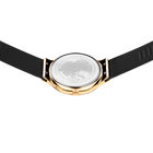 Watch caseback with BERING engraving, gold-tone case, black fabric strap