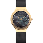 BERING wristwatch with gold case, dark textured dial, and black mesh band.
