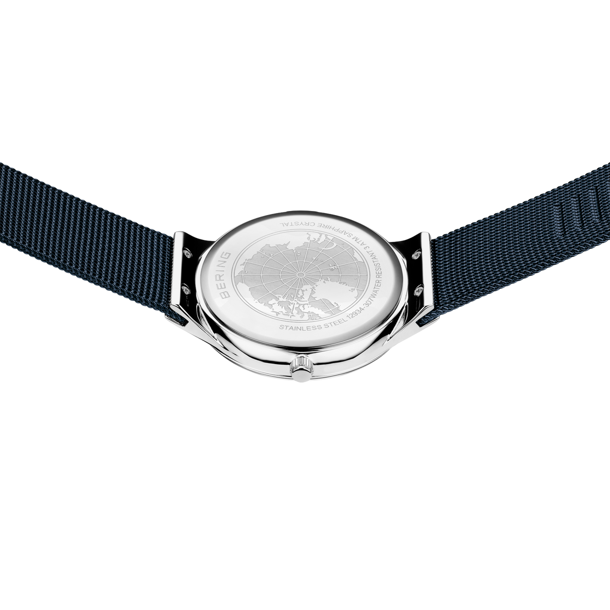 Watch viewed from above, showing dark fabric strap extended on both sides and metallic case