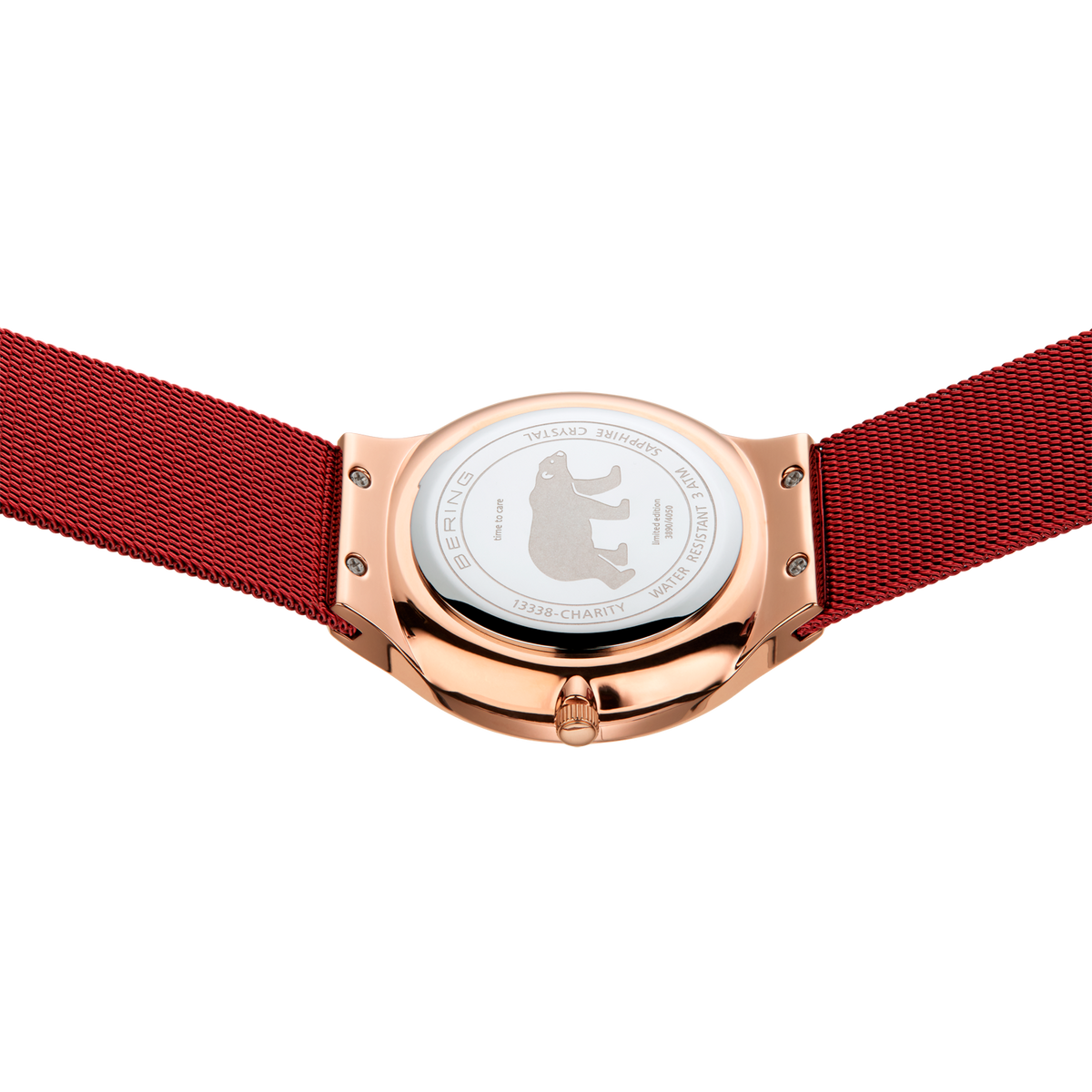 Rose gold watch case with white dial and deep red fabric strap, viewed from below to show the transparent case back.