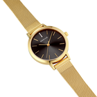 Gold mesh wristwatch with black dial and slender indexes, viewed at angle