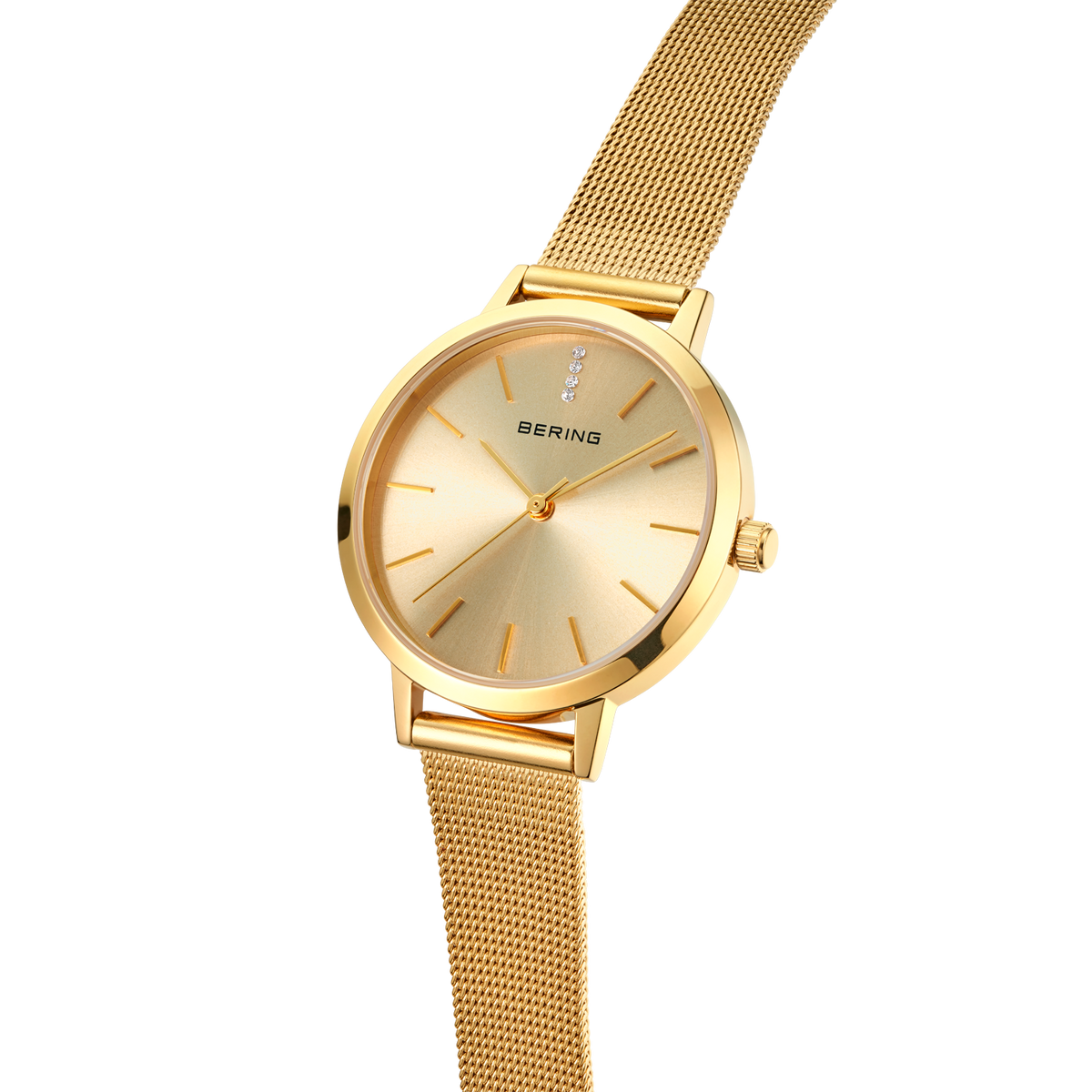 BERING gold-tone wristwatch with round case and mesh band, three-quarter angle view.