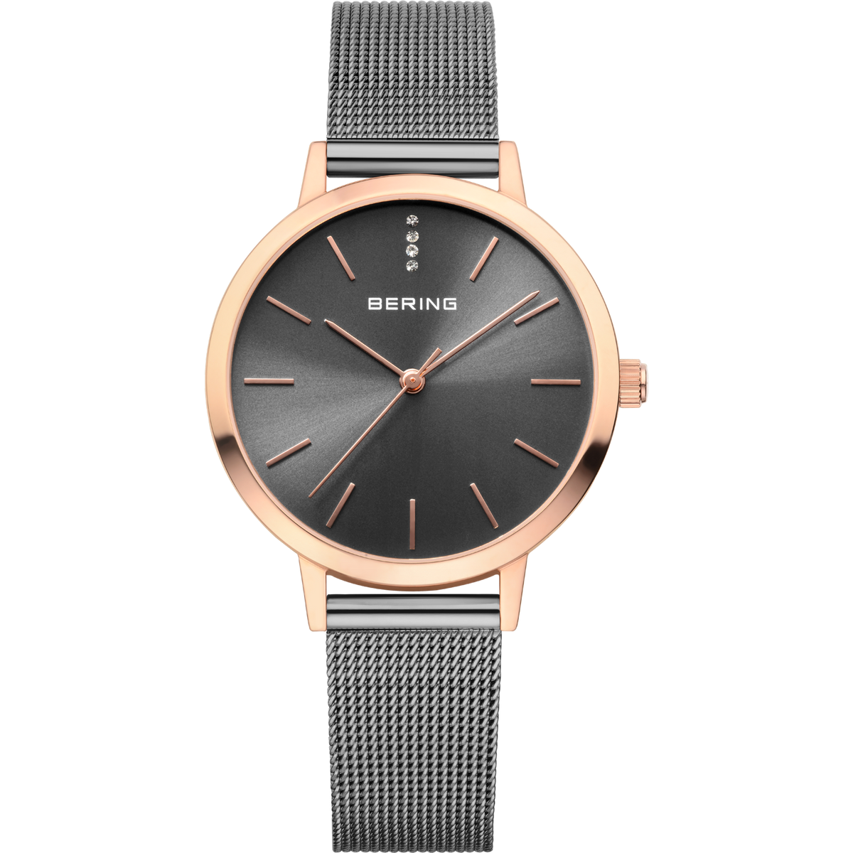 Montre BERING avec boîtier en or rose, cadran gris foncé, index minimalistes et bracelet en maille grise.