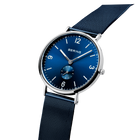 BERING watch with blue dial and silver-tone round case, dark blue fabric strap, angled view.