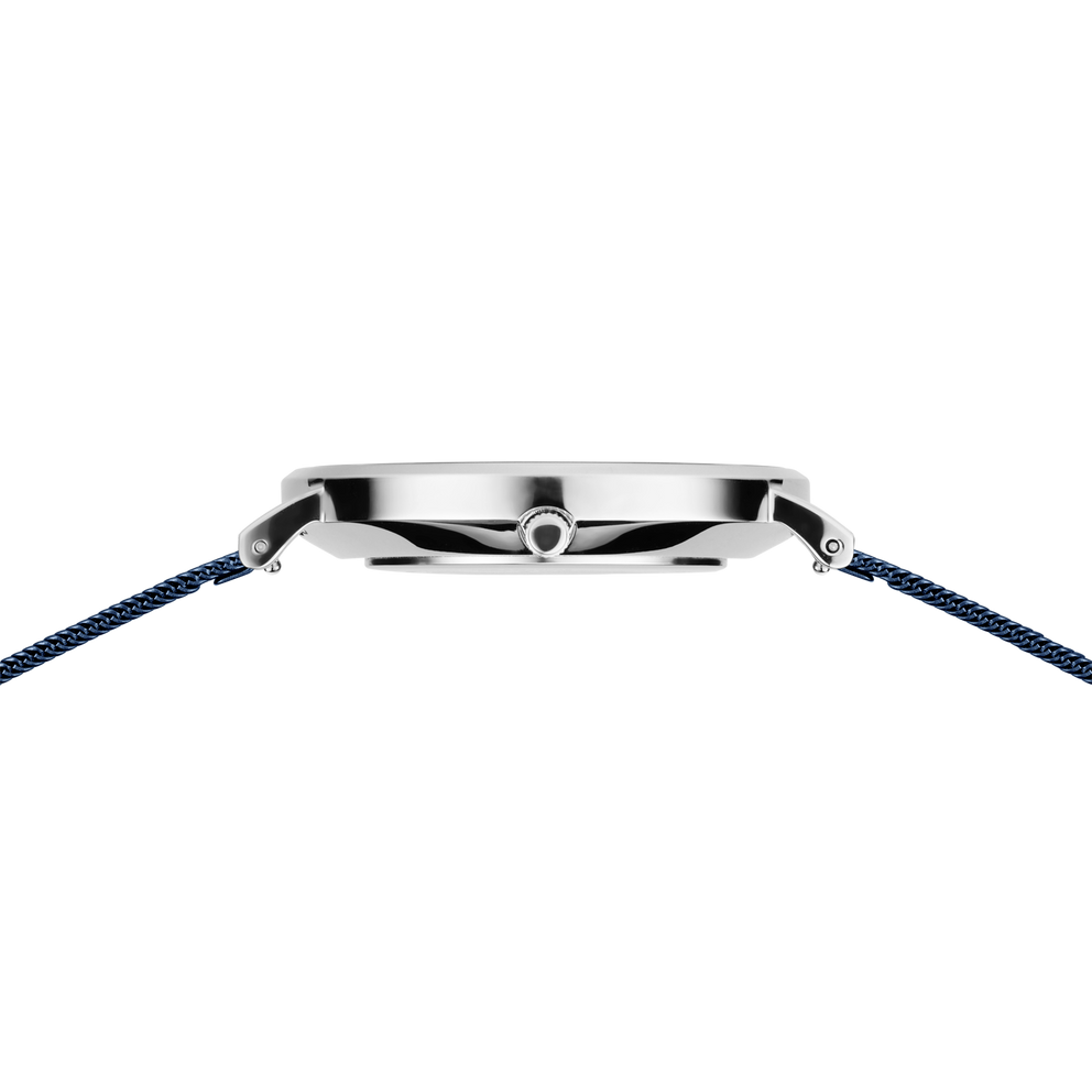 Silver watch case with black dial and navy fabric strap, viewed from above