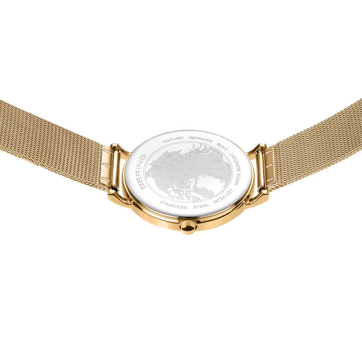 Caseback view with transparent display revealing the mechanical movement; gold-tone case and mesh band.