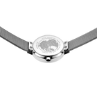Wristwatch detail: round dial with world map design and gray mesh band