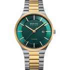 Reloj BERING Solar con esfera azul-verde, caja de titanio y pulsera bicolor plateada-dorada
