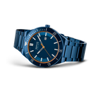 Dark blue BERING wristwatch with matching metal band, side angle view showing dial and linked bracelet.