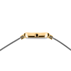 Watch case side profile in gold with gray mesh bracelet