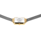 Square watch with gold case, white dial, and gray mesh bands, viewed from above.