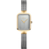 BERING wristwatch with rectangular gold case, silver dial, and two-tone mesh bracelet.