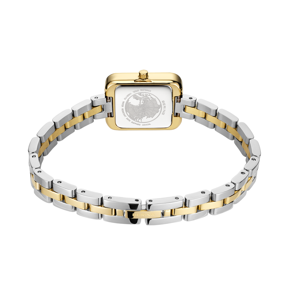 Guld og sølv BERING ur vist med armbånd, bagsidevisning viser husets mærke