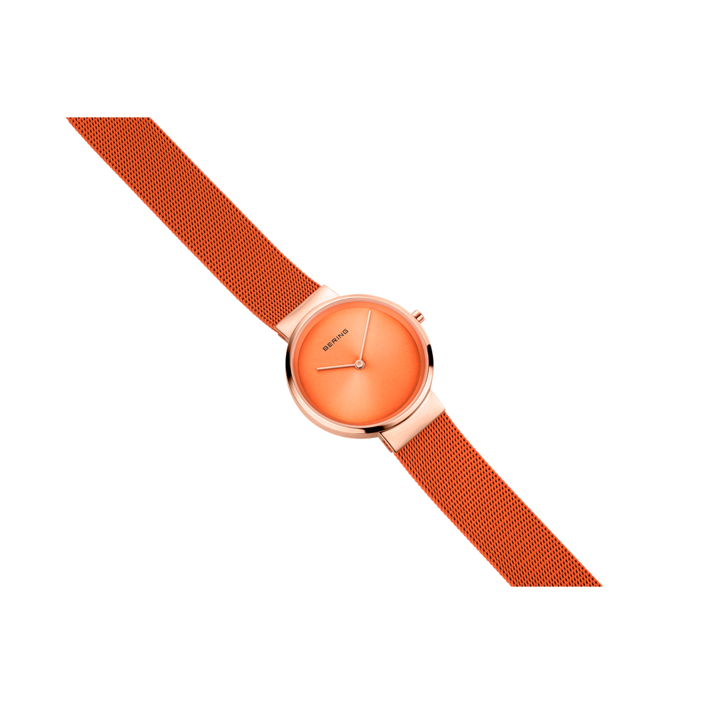 BERING wristwatch 14531-565 with coral dial and matching fabric strap, angled view