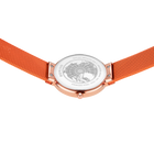 Wristwatch with rose-gold case and orange fabric strap, viewed from above with patterned dial.
