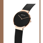 Orologio BERING con cassa in oro rosa, quadrante nero e cinturino maglia nera