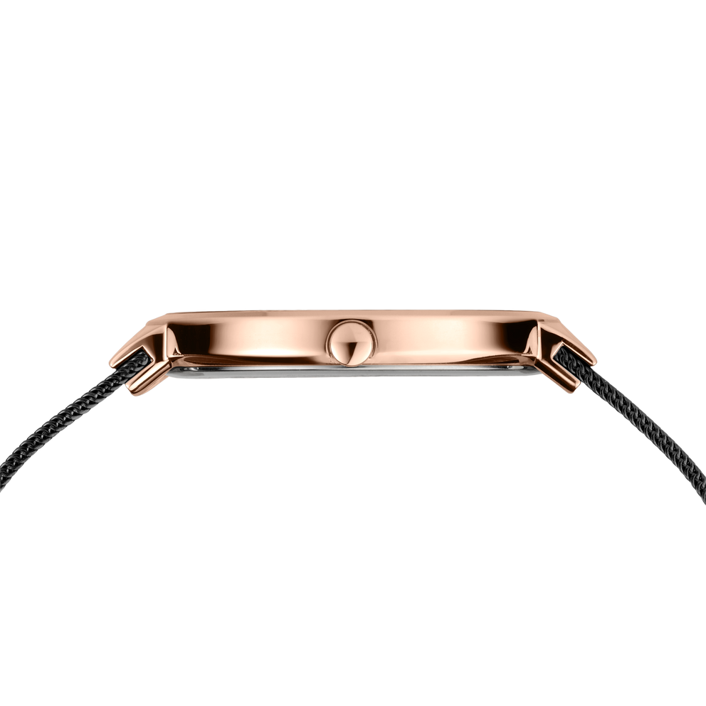 Cassa dell'orologio in oro rosa vista dall'alto con cinturini neri su entrambi i lati.