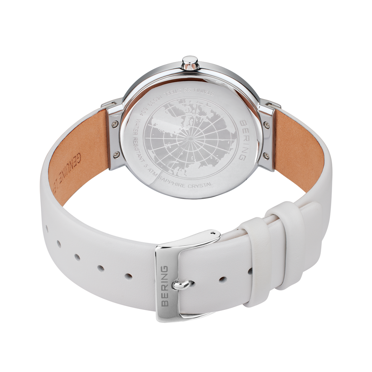 Rückseite mit strukturiertem Gehäuseboden, silbernem Metall-Gehäuse, weißem Silikonarmband mit braunen Akzenten.