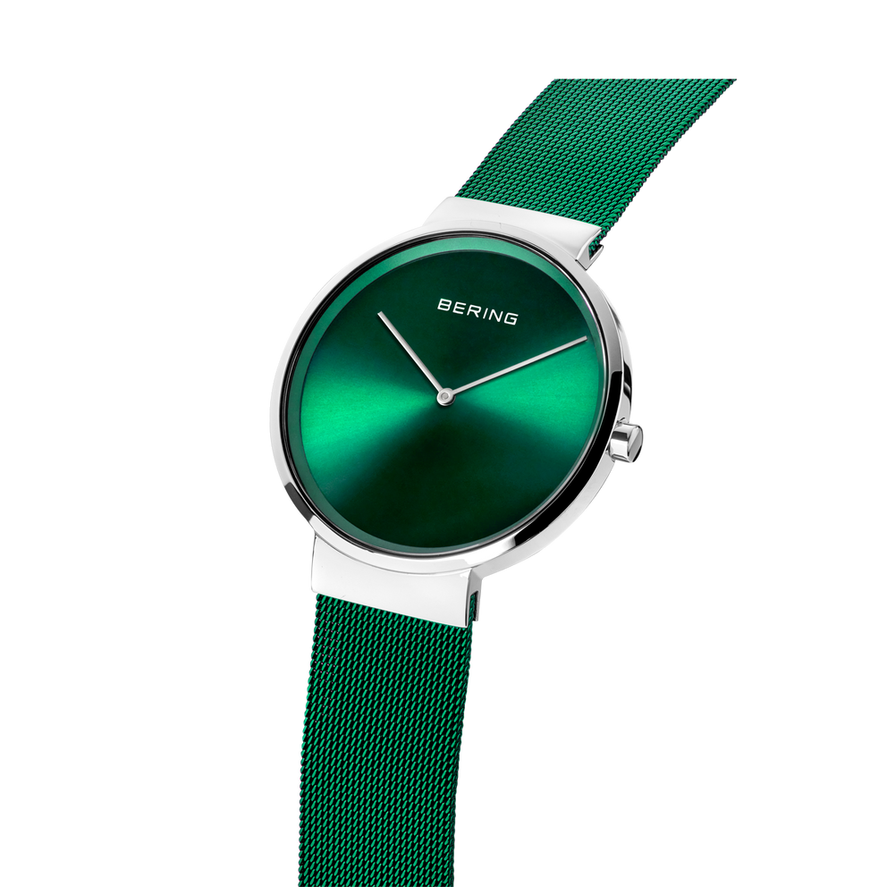 Orologio BERING con quadrante verde sfumato e lancette bianche su cinturino in tessuto verde intrecciato
