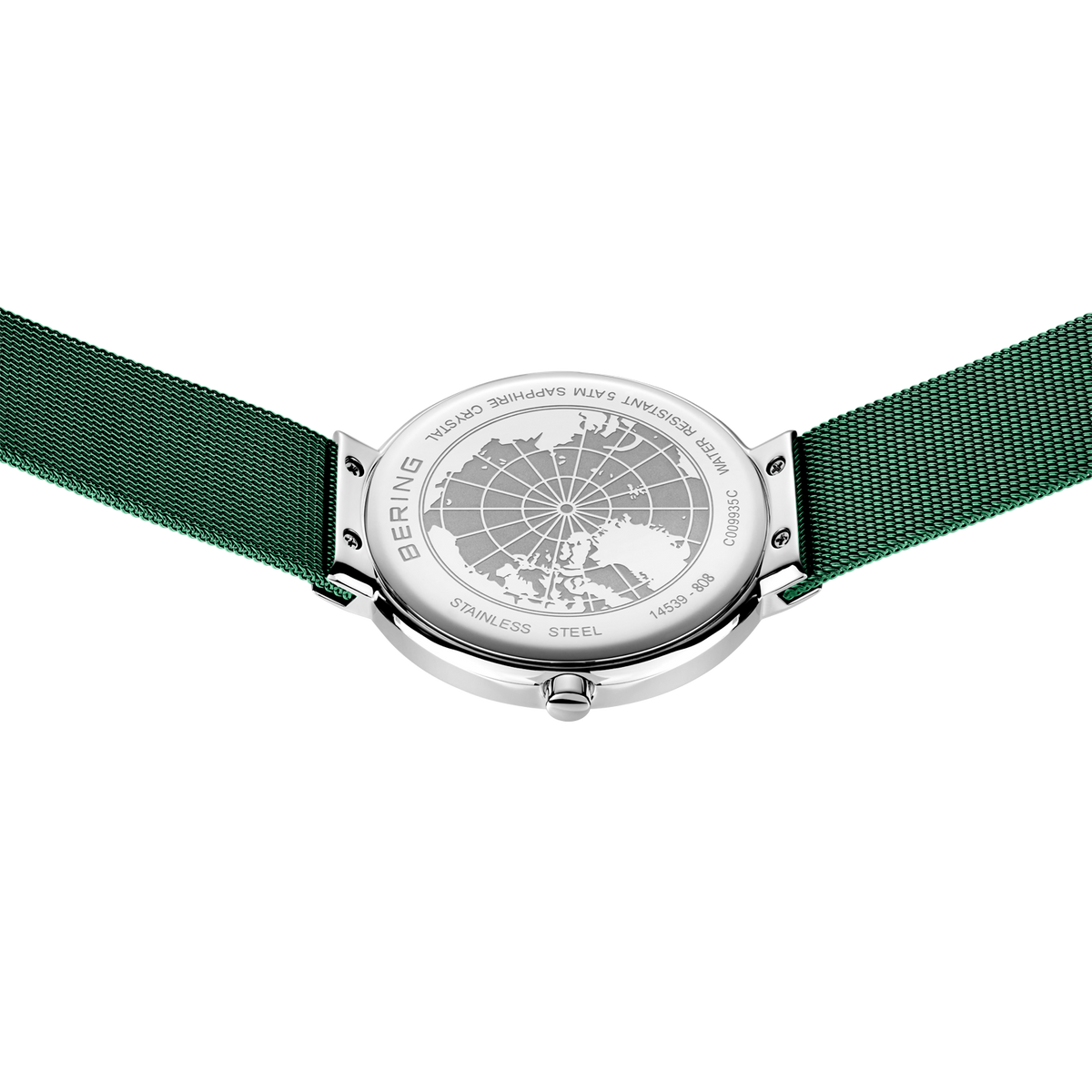 Orologio con cinturino in tessuto verde, fotografato dall'alto con quadrante a mappa mondiale