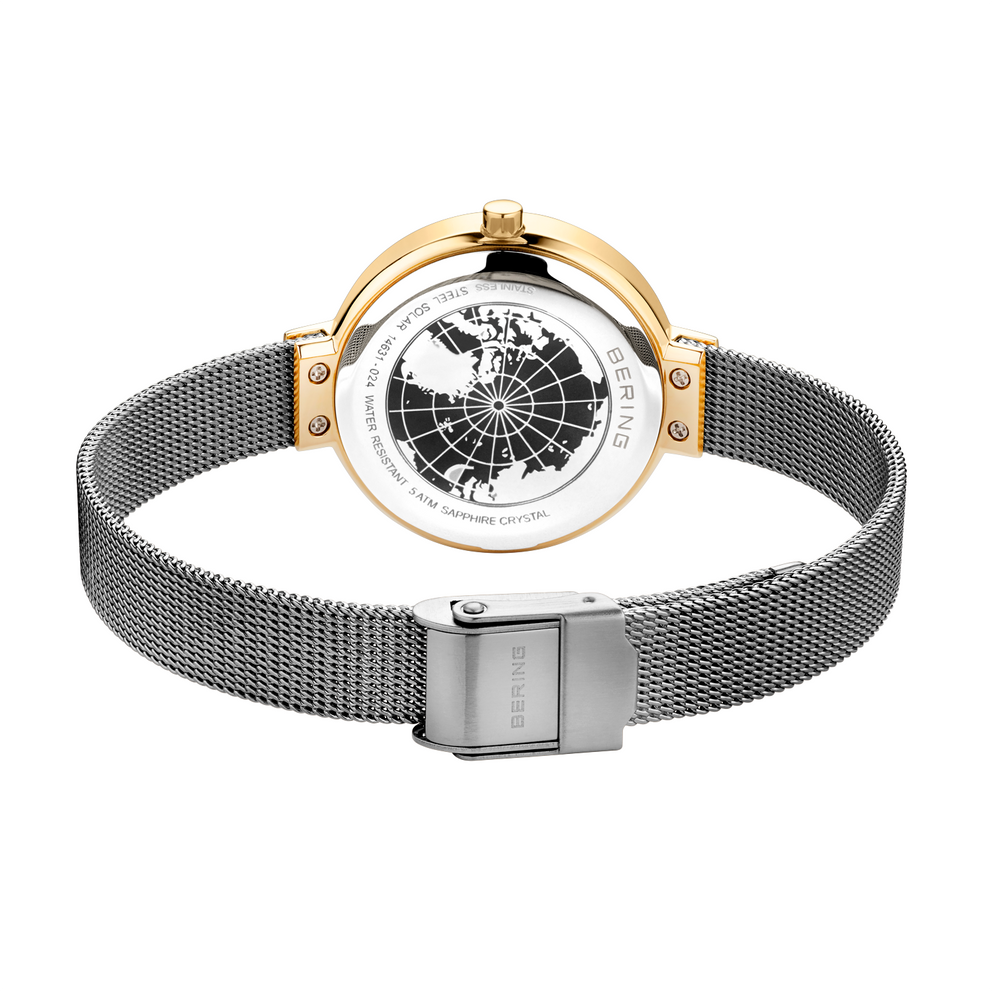 Watch with white globe dial, rose gold lugs, and metal mesh band