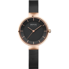Orologio BERING Solar con cassa in oro rosa, quadrante nero e cinturino mesh nero.