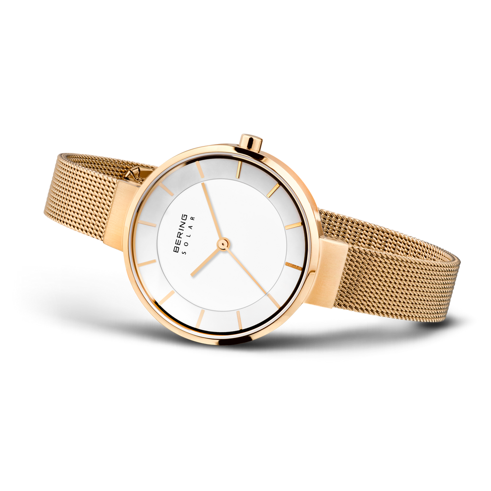 Gold-tone BERING wristwatch with white dial and mesh bracelet, shown from the side.