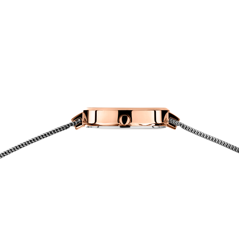 Rose-gold rectangular watch case with textured mesh metal strap, overhead detail view
