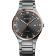 BERING wristwatch with titanium bracelet, dark dial, orange bezel accents, and white markers