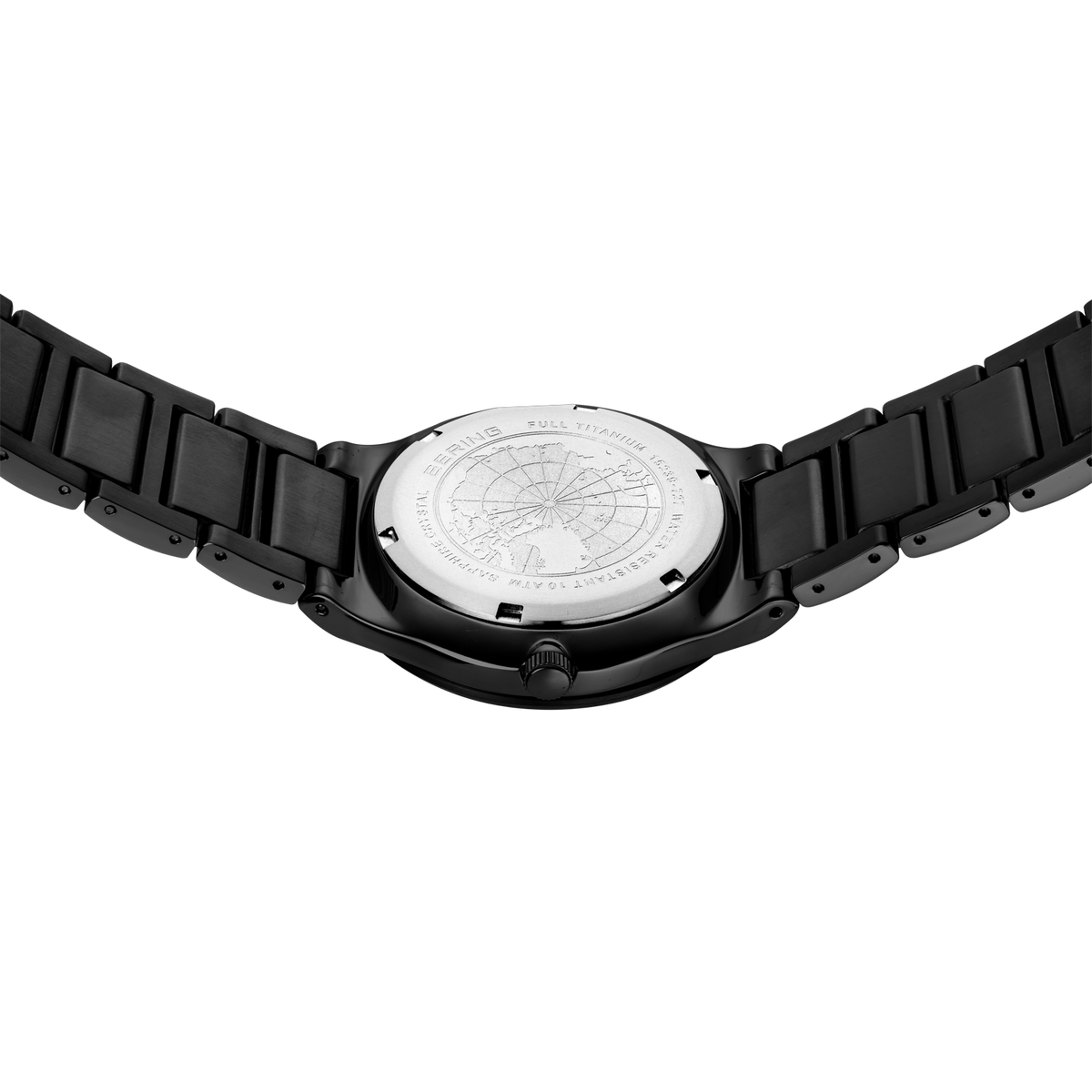 Uhr mit schwarzem Schliederarmband von hinten, texturierte Gehäuserückseite sichtbar.