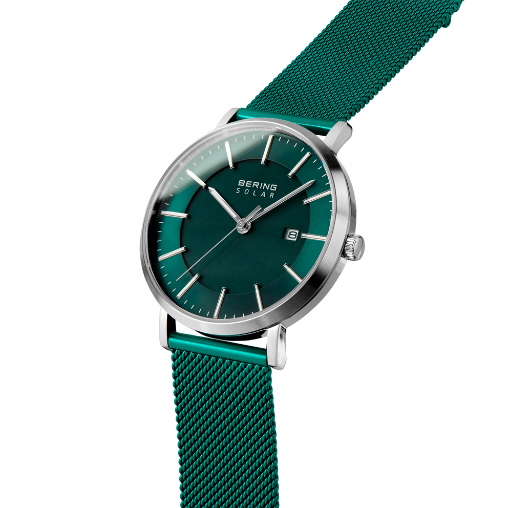 BERING-horloge 15439-808 met turquoise wijzerplaat, turquoise mesh-band, zilveren kast, datumvenster om 3 uur.