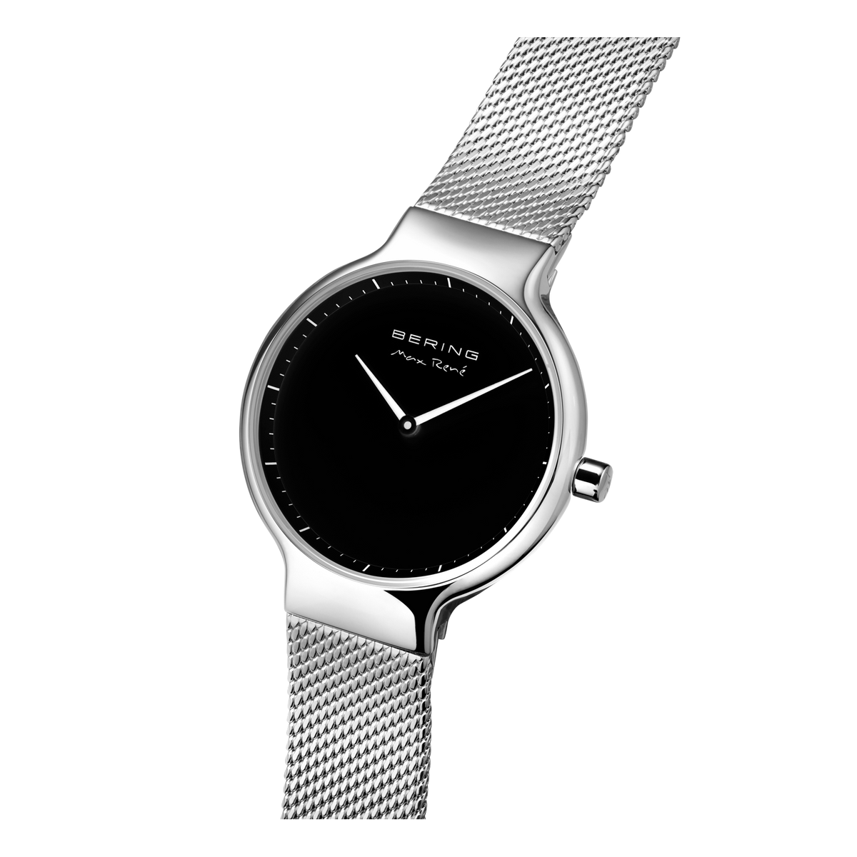 Watch angled from above with black dial and silver mesh band clearly visible