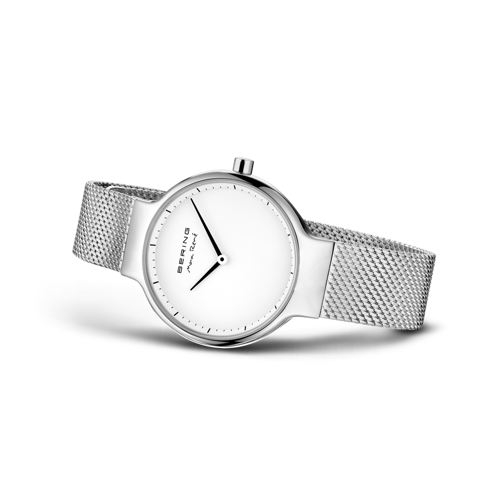 BERING watch with white dial and mesh metal band, photographed from the side