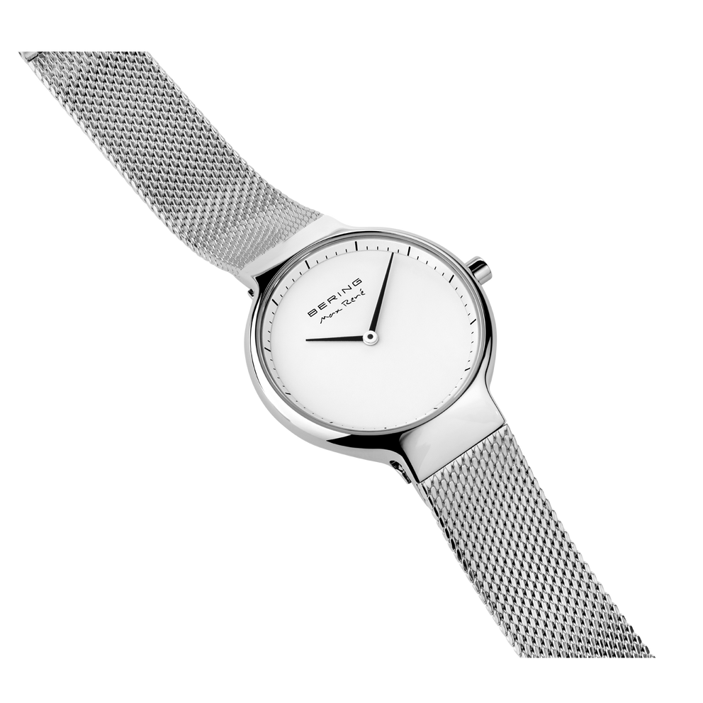 BERING minimalist wristwatch with white dial and mesh metal strap, angled profile view