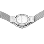BERING watch caseback with mesh bracelet, showing engraved brand marking