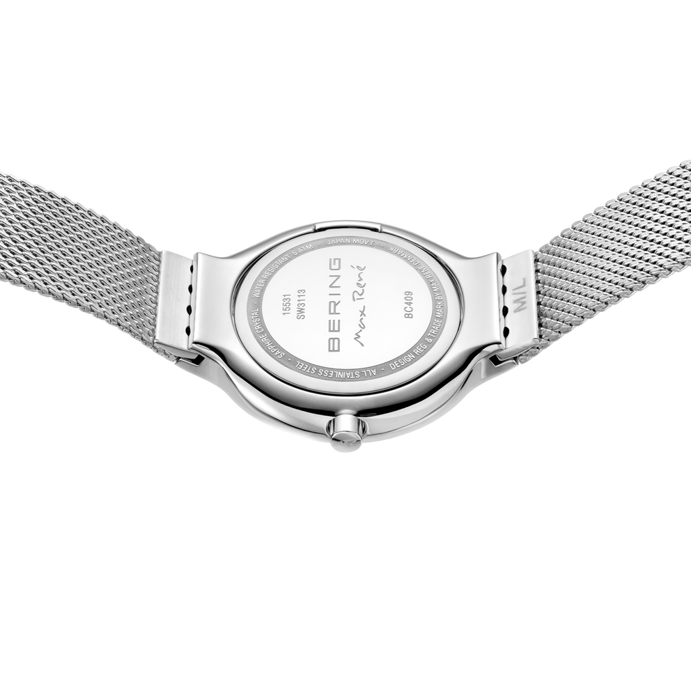 BERING watch caseback with mesh bracelet, showing engraved brand marking