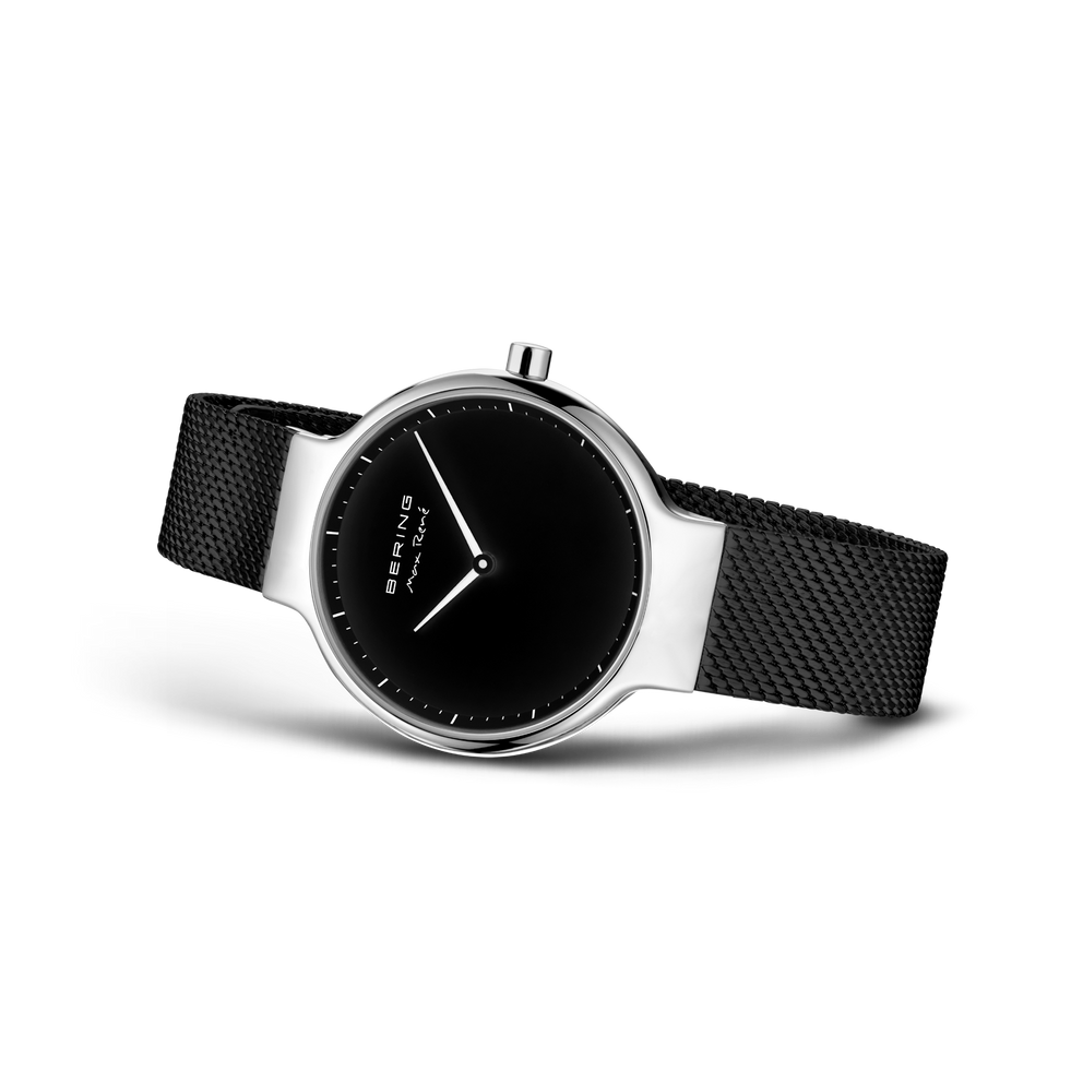 BERING watch with silver case and black mesh band, shown at 45-degree angle