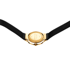 Gold-tone round watch case with black fabric strap, rear view