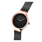 Watch with rose gold case, black dial and white hands, paired with black mesh bracelet in three-quarter view.