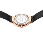 Watch case back and strap, rose gold finish with BERING dial text visible on case back.