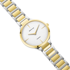 Orologio da polso BERING bicolore con bracciale oro e argento, quadrante bianco strutturato, mostrato completamente.