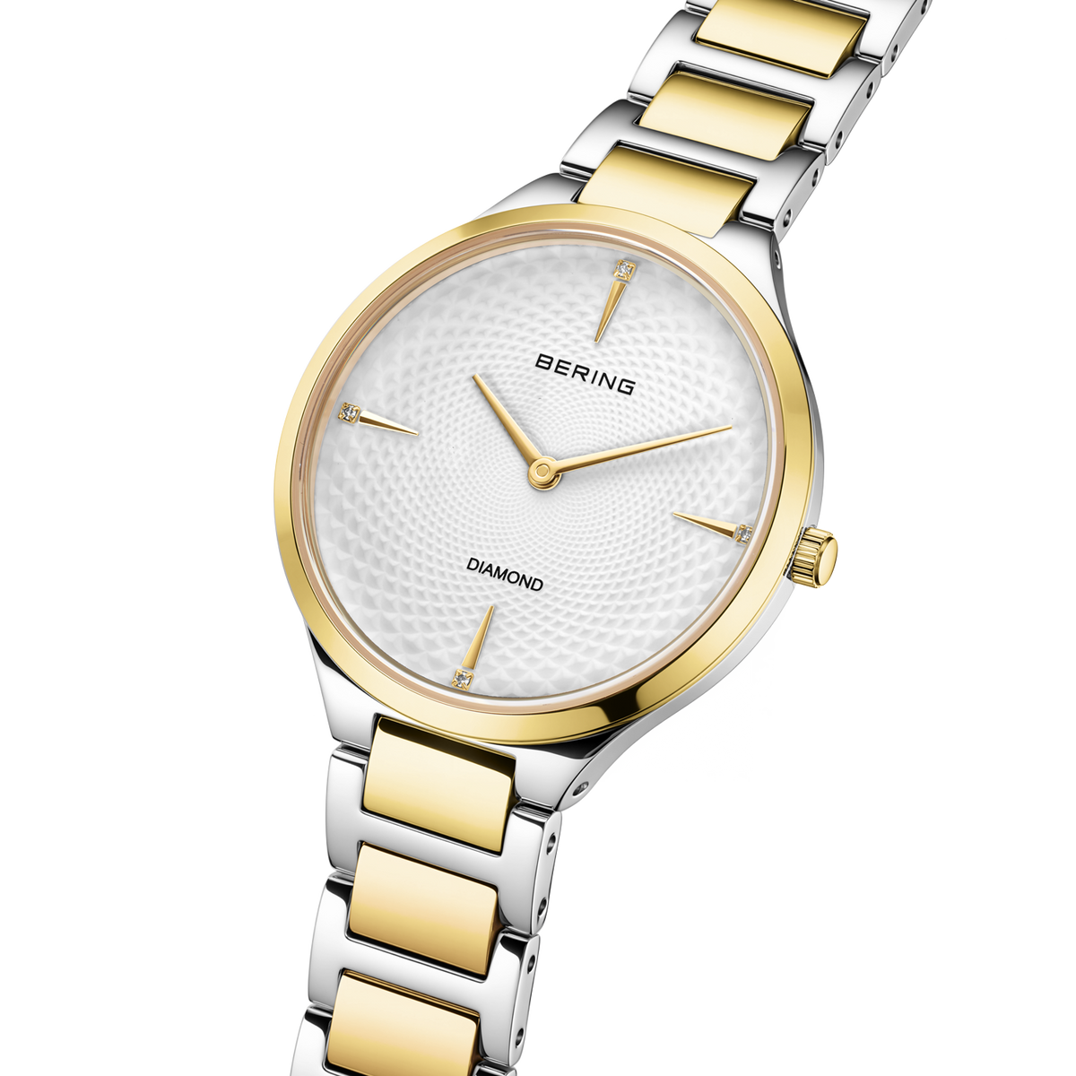 Orologio bicolore con cinturino alternato, quadrante bianco testurizzato, marchio BERING