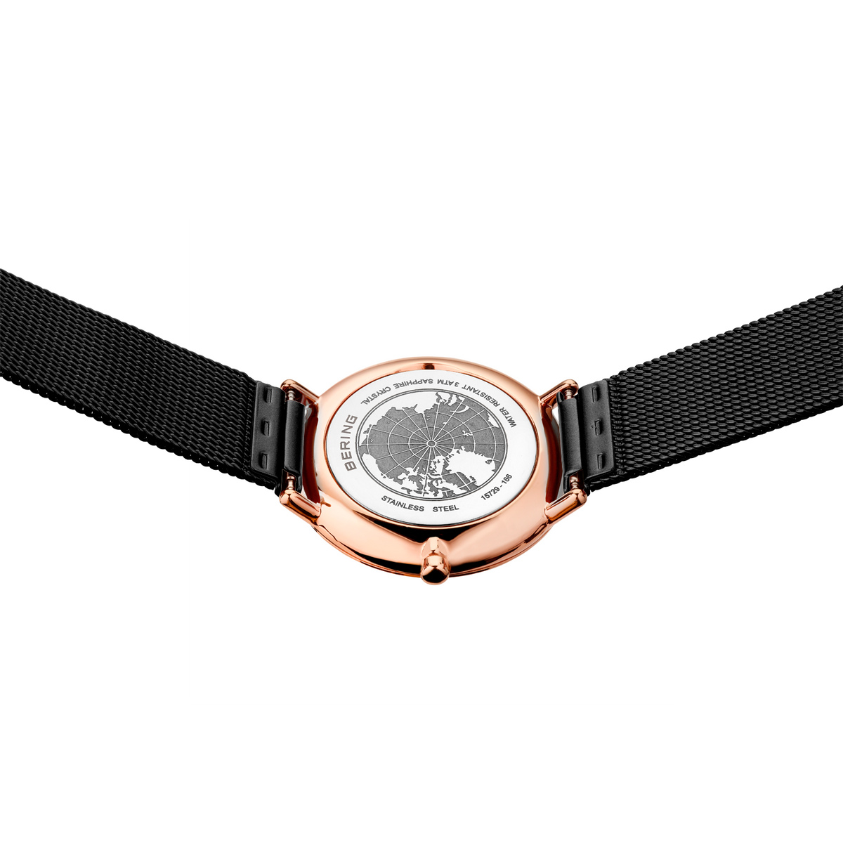 Rose gold watch with world map dial and black mesh strap, viewed from above