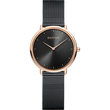 Orologio rotondo in oro rosa con quadrante nero, design minimalista e cinturino a maglie scure, vista frontale.