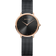Round rose gold watch with black dial, minimalist design, and dark mesh bracelet, shown straight on.