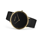 BERING horloge met zwarte wijzerplaat, gouden kast en zwart textielbandje