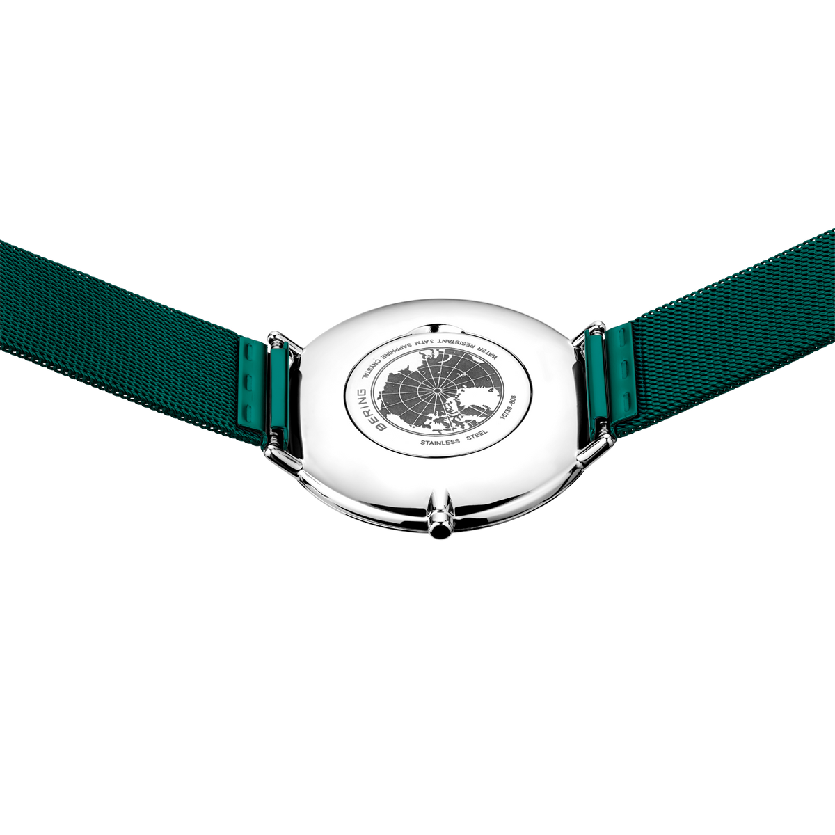Round silver watch with dark green fabric strap, shown from above with engraved circular dial detail visible.