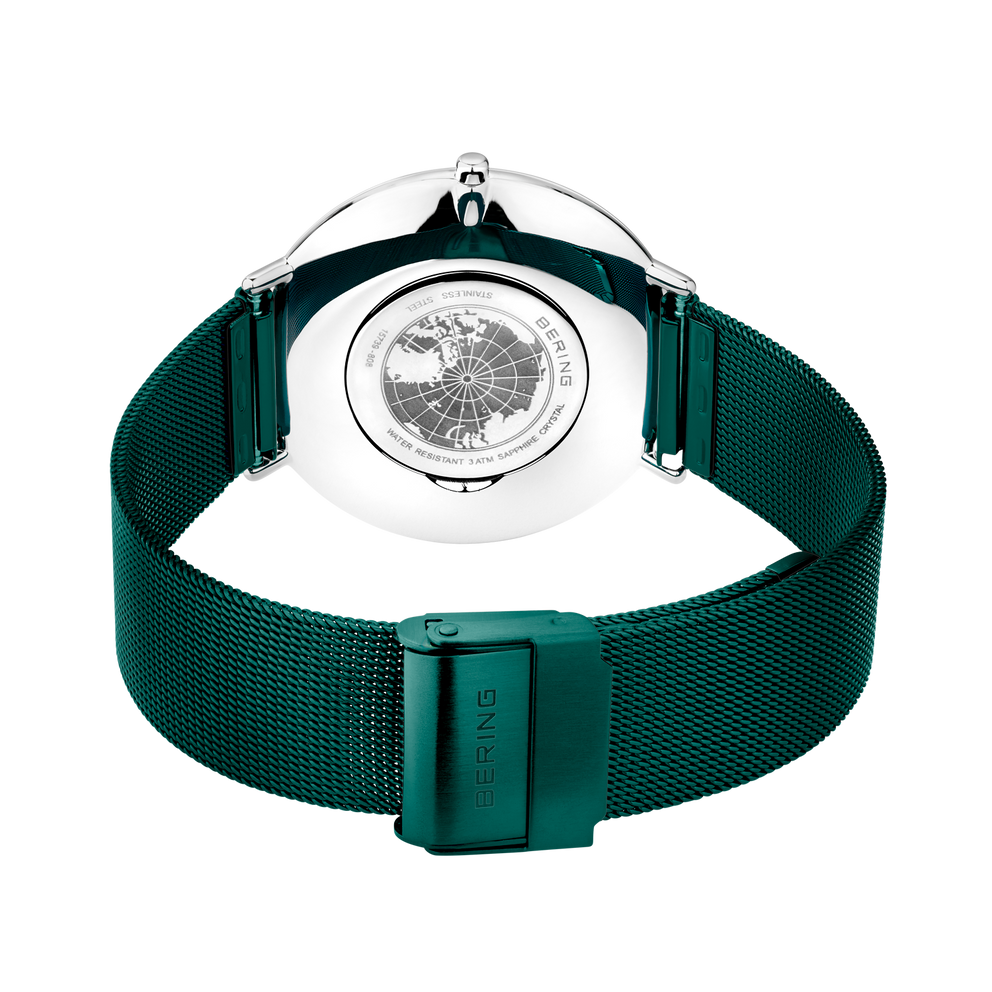 BERING watch with dark green mesh bracelet viewed from above, featuring a white dial with world map design.