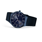 BERING wristwatch with dark blue dial and black mesh band, angled three-quarter view of case and strap.