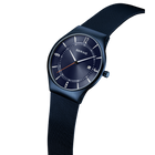 Dark blue BERING watch displayed at angle, showing navy mesh band and dial with hour markers.